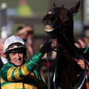 Barry Geraghty celebrates victory in the Unibet Champion Hurdle aboard Buveur D’Air