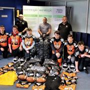 Thames Valley Tigers proudly show off the new kit their Sport England funding and new sponsorship has enabled them to purchase