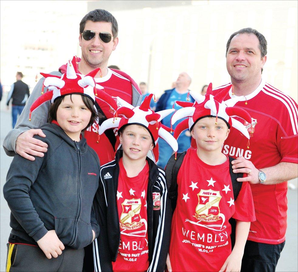Thousands of fans in the Red and White Army flock to Wembley to cheer on Swindon Town against Chesterfield
