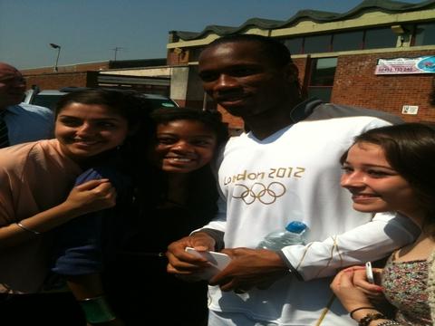 Your flame to fame. 
Readers' pictures capture memories of the Olympic Torch in town.
- Drogba meeting fans in Bassett 