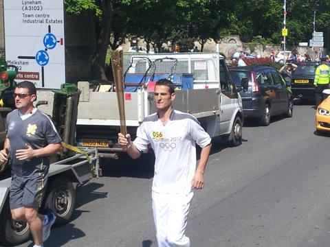 Your flame to fame. 
Readers' pictures capture memories of the Olympic Torch in town