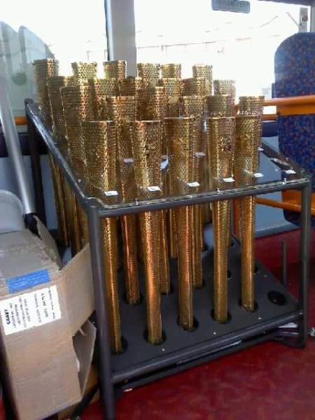 Your flame to fame. 
Readers' pictures capture memories of the Olympic Torch in town - This was the torches at Royal Wootton Bassett before they were distributed to the Torch Bearers on route.
Dave Woods Swindon 105.5
