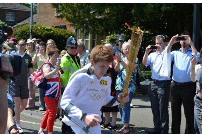 Your flame to fame. 
Readers' pictures capture memories of the Olympic Torch in town.
Picture taken in Royal Wootton Bassett - Dave Sheppard
Age 67
