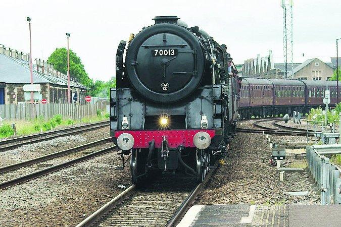 Pictures snapped by readers of the Swindon Advertiser. Oliver Cromwell  70013 built Crewe works 1951, pictured at Swindon station 
Picture: WILLIAM BRYAN