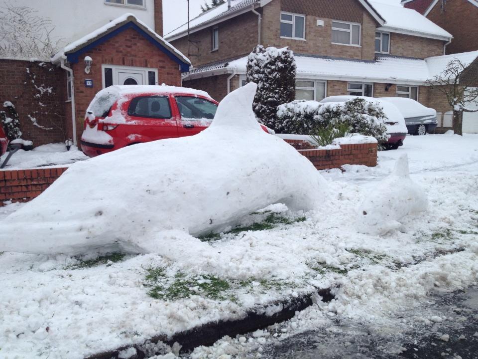 Snow sculpture: Dolphins