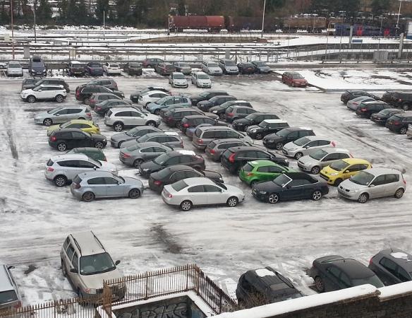 This is the scene from our offices overlooking the car park at the Swindon station.
Notice how the cars have dutifully followed each other into 4 rows of parking.
The middle two rows have no chance of getting out!
