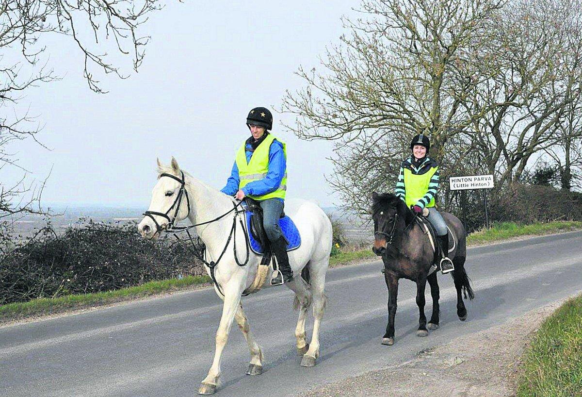 Swiindon Advertiser readers photographs
 Two horse riders near Wanborough
Picture: Ken Mumford