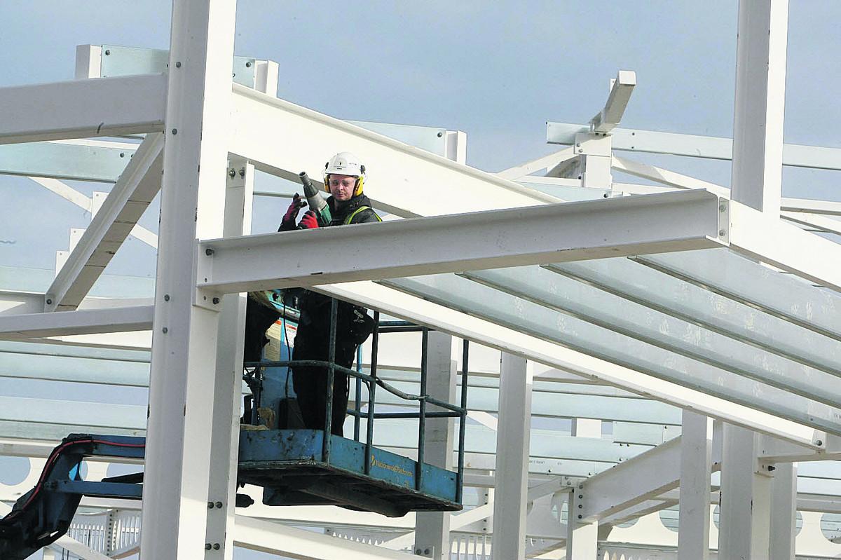  A construction worker on the former Swindon College site putting up steelwork for the new £50m retail and leisure development   