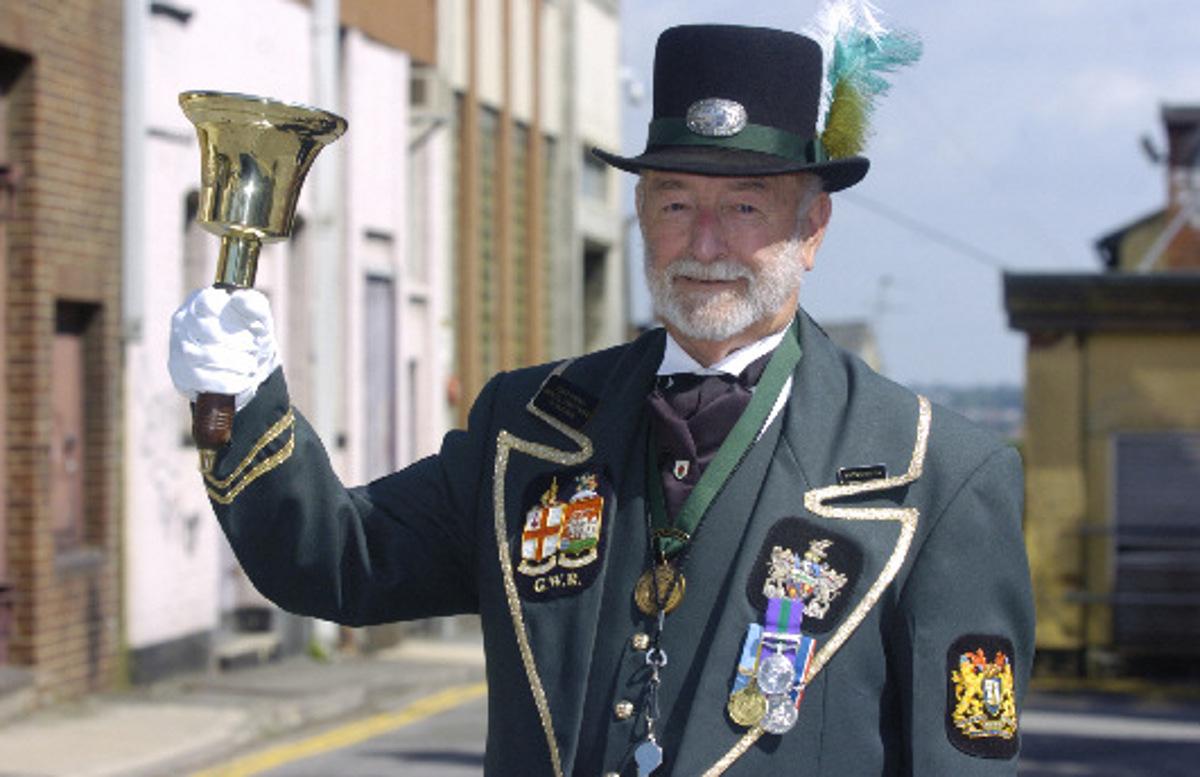 2006: Town Cryer Fred Ferris with the award he recently won for being the best dressed town crier. Here wearing his new suit.