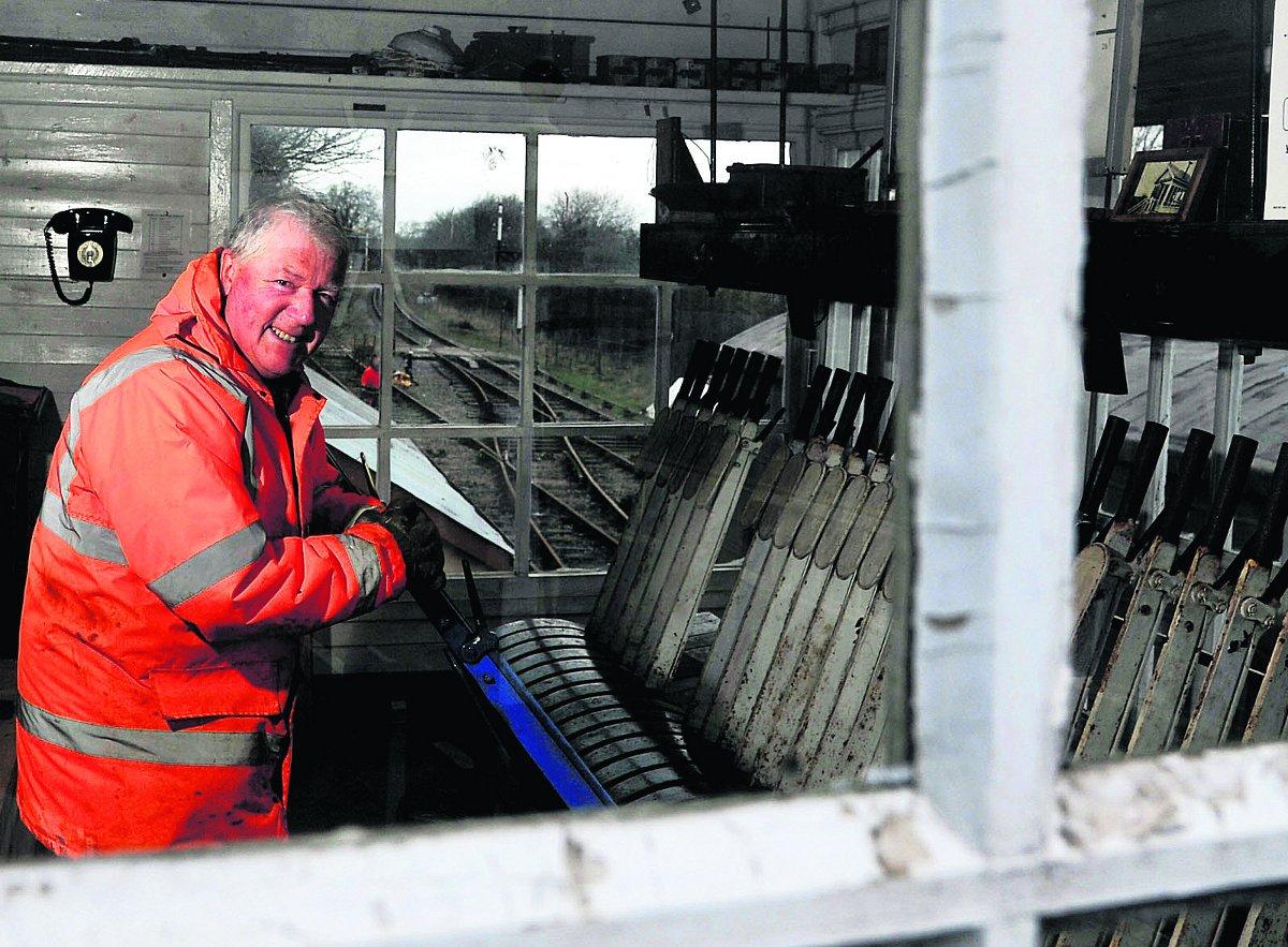 n Peter Rutler hard at work in the signal box at the Swindon and Cricklade Railway   				         Picture: DAVE COX