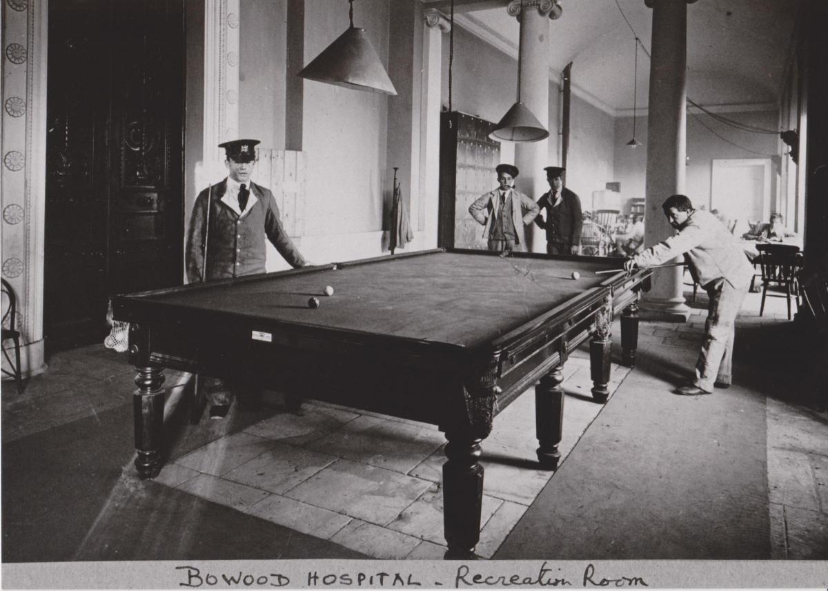The recreation room at Bowood Hospital. Servicemen can be seen playing billiards.