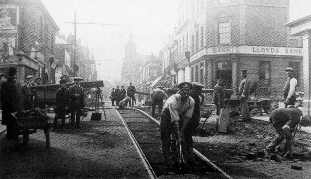 Soldiers stationed in Swindon were often used to help with local jobs, such as these men working on the tram rails in Regent Street.
