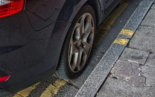 Cars have been parking on double yellow lines outside the school