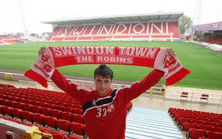 Austin signs for Swindon in October 2009