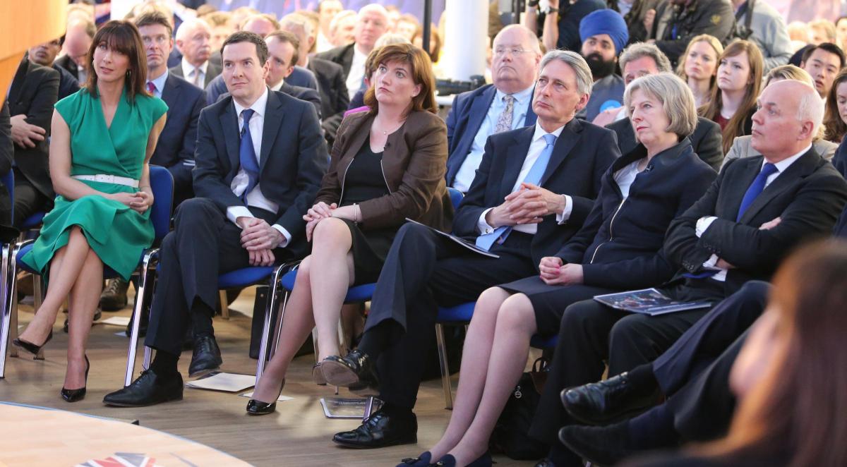 Cabinet members listen to Prime Minister David Cameron at Swindon UTC