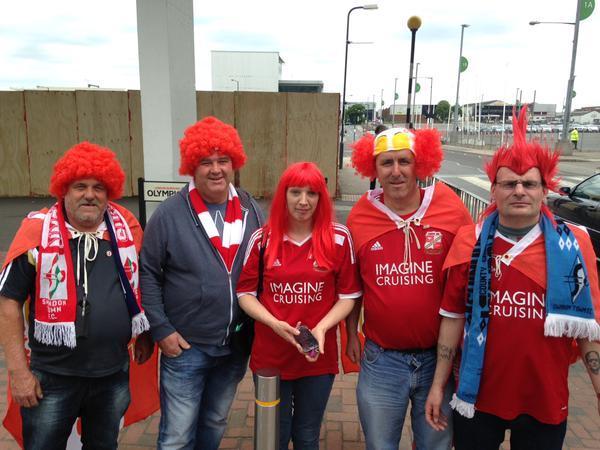 Beren Cross pictured fans in wigs and scarves ready for the kick off