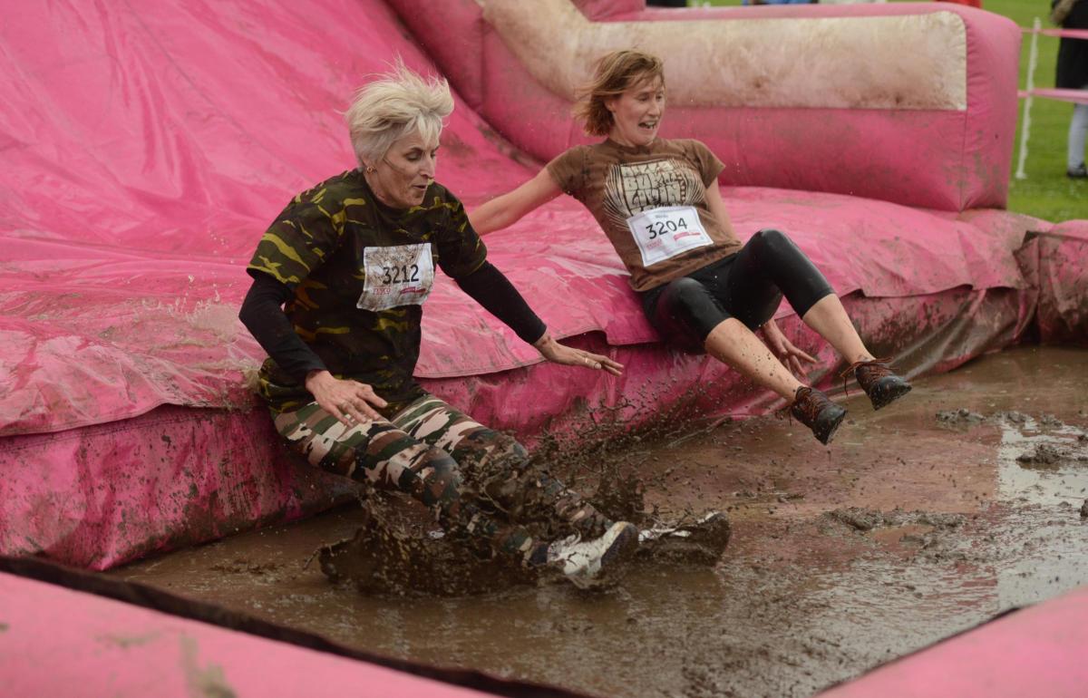 Tackling the dirt at Lydiard Park in the 5k Preddy Muddy event in aid of Cancer Research UK. Picture by Clare Green/www.claregreenphotography.com
