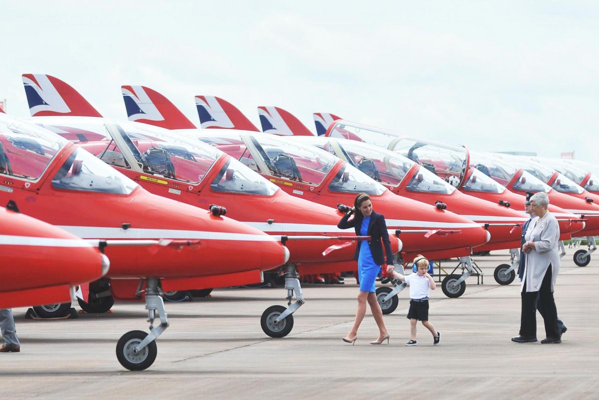 The Duchess of Cambridge leads Prince George to the Red Arrows' Hawk jets. Picture: Thomas Kelsey