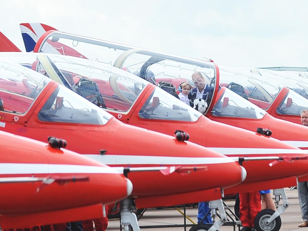 Prince George and Prince William inspect Red Arrows' Hawk jets at RIAT. Picture: Thomas Kelsey