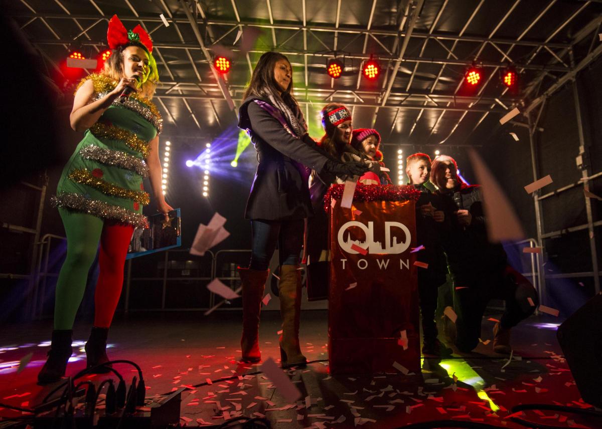 Fun as Old Town's Christmas lights are switched on in glittering ceremony. Picture by Claire Green
