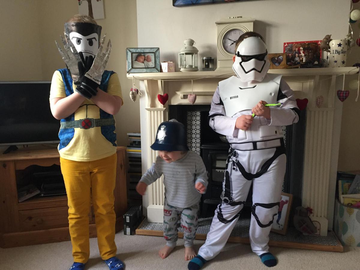 Lachlan, Albie and Jack as Wolverine, a policeman and a stormtrooper pictured by Jill Armour