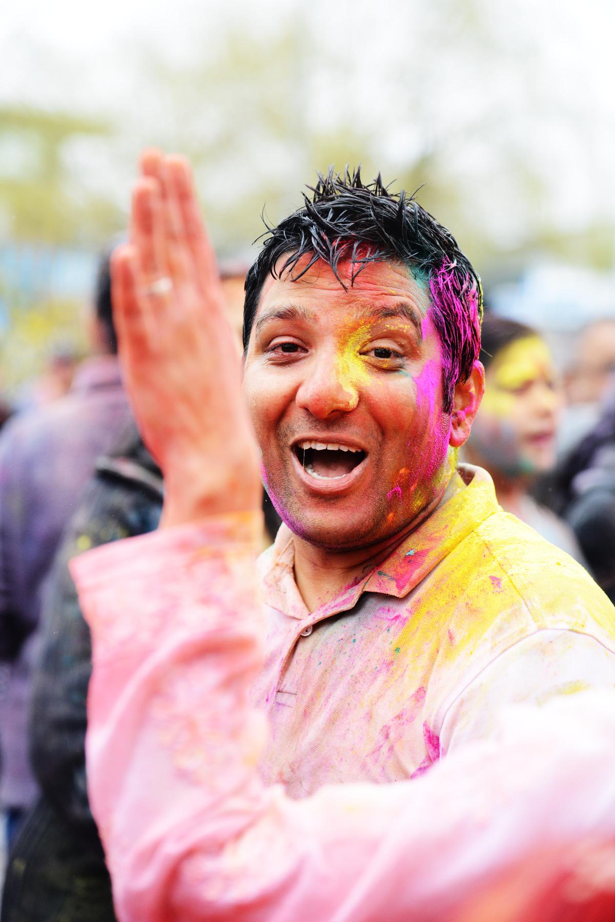 All the colours of the rainbow at Holi Festival. Picture by Thomas Kelsey
