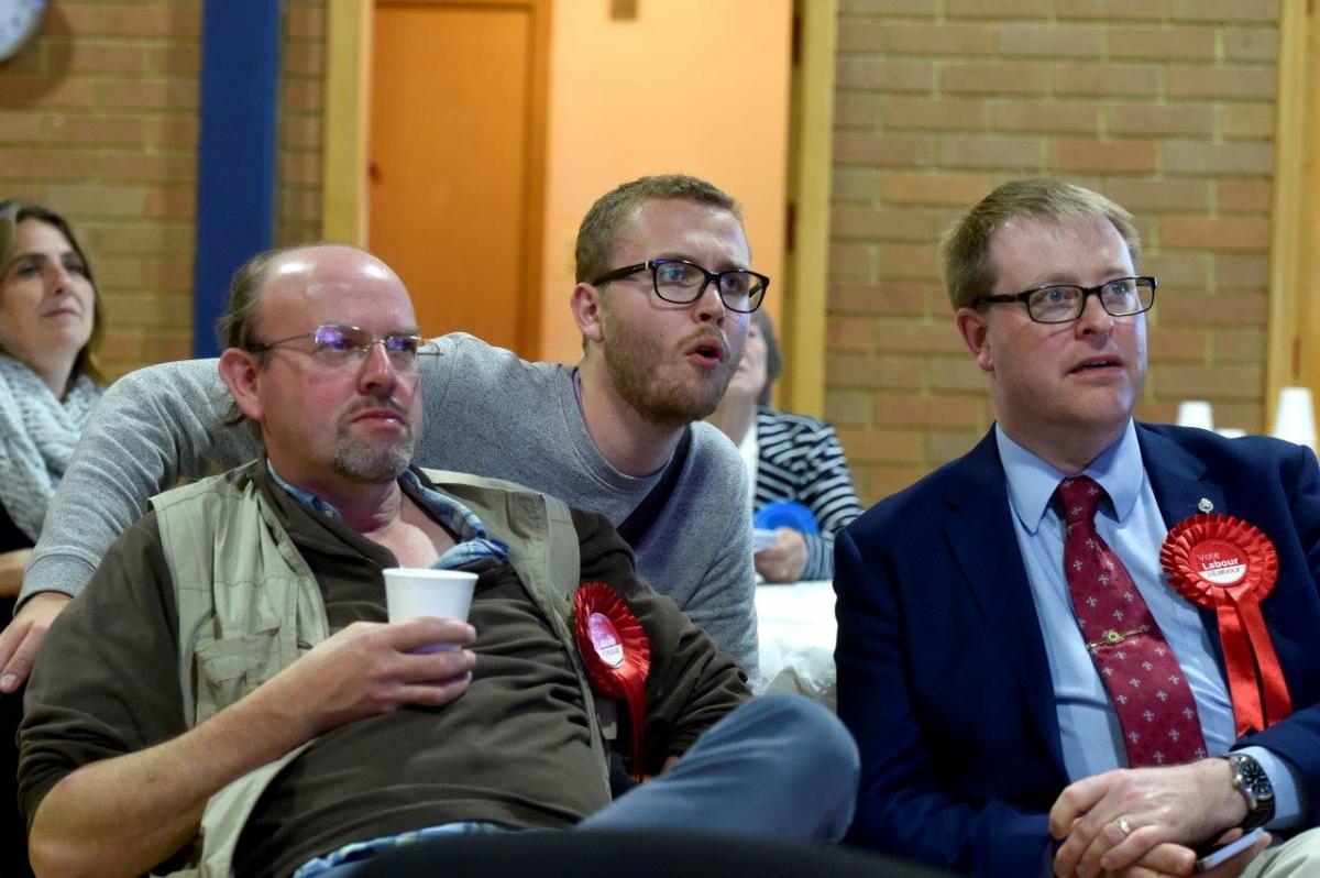 Labour's Peter Baldrey, right, and supporters at the count in Malmesbury. Picture by Diane Vose
