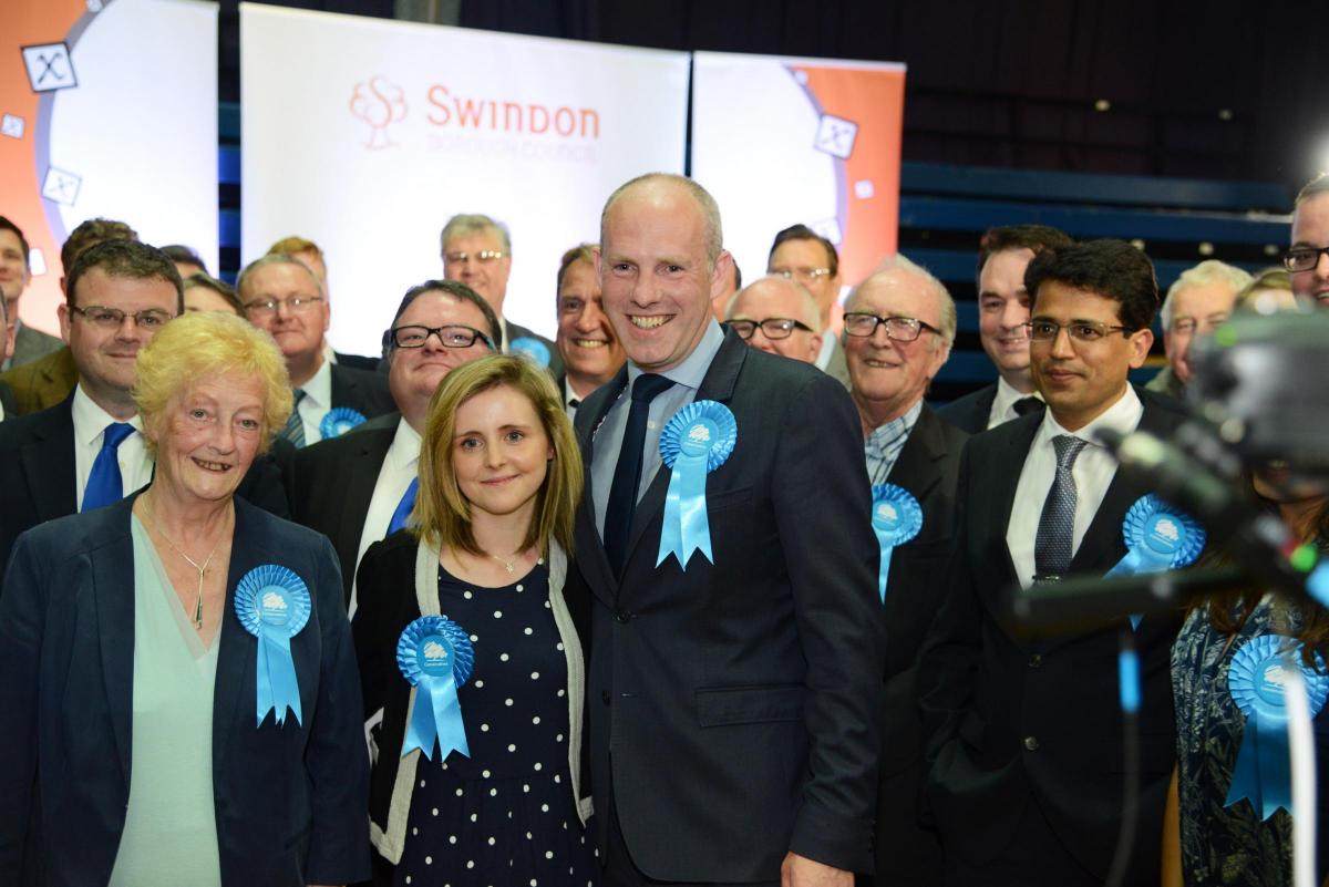 MP Justin Tomlinson celebrates his victory in North Swindon with his Conservative supporters. Picture by Thomas Kelsey