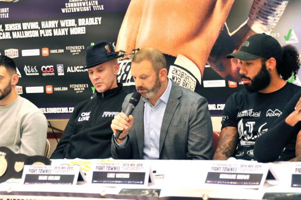Mark Neilson (centre) address the media and public ahead of Fight Town IV - the show will now take place later in the year after coronavirus caused the event to be postponed.