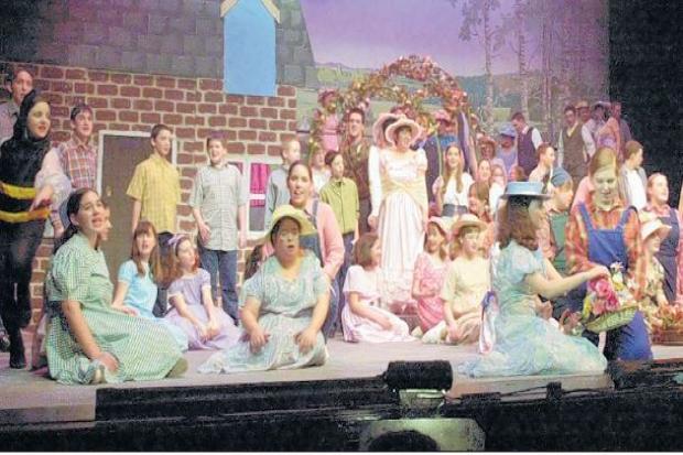 The town’s Scouts and Guides appeared in Step Into Spring at the theatre in 2002