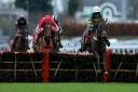 Epatante ridden by jockey Barry Geraghty goes onto win the Ladbrokes Christmas Hurdle during day one of the Winter Festival at Kempton Park Racecourse..