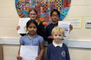 The winners of a short story competition at Lethbridge Primary School about Local Heroes
