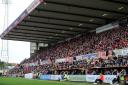 The Don Rogers Stand full during the match between Swindon Town and Rochdale at The County Ground Stadium , Swindon, England on Saturday the 16th of October 2021. The EFL League Two, Photo by Rob Noyes..