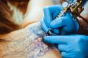 A change in licensing policy will allow tattoo conventions in Swindon. One is being planned for June