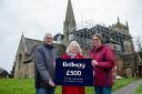 Tony Pullan, Bellway project manager, Gaynor Hall, churchwarden and Nicky Pullan, committee member in front of St Andrew's Church