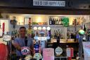 Sanjay Dogra inside The Harrow Inn pub in Wanborough, on the one year anniversary of being its landlord