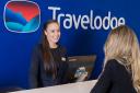 Stock image of a Travelodge employee