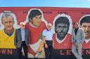 Don Rogers, John Trollope, and Chris Kamara pose next to their younger selves at the STFC mural on Carfax Street