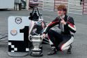 Swindon's Lucas Romanek poses with the Ulster Trophy at Kirkistown