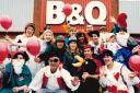 B&Q staff wear fancy dress to celebrate the revamped Fleming Way shop reopening in February 1995