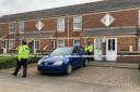 A Swindon man charged with murder was taken away in an ambulance before he was due to appear in court. Pictured: Police at Westbourne Court in Rodbourne.