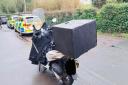 The delivery driver's motorbike was seized by Wiltshire Police