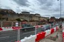 Traffic on the temporary road past York Station this week - with the city walls in the background