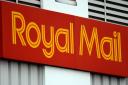 Royal Mail’s parent company did not give a new date for publishing its results (John Giles/PA)