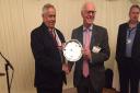 Robins co-promoter Colin Pratt (left) picks up the parliamentary award