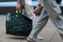File photo dated 20/05/14 of a person carrying a Marks and Spencer carrier bag near Marble Arch, London, as the high street giant said it will accelerate its clothing store closure plans and slow Simply Food openings as it posted a 5.3% fall in half-year 