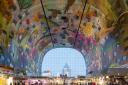 Undated Handout Photo of the Markthal. The dome is decorated with images of the fresh products sold in the hall. See PA Feature TRAVEL Rotterdam. Picture credit should read: PA Photo/Ossip van Duivenbode. WARNING: This picture must only