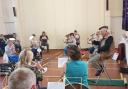 Fran Cowley conducts his last session of the Swindon Brass Band