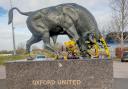 Tributes to Joey Beauchamp were laid on the Ox statue outside the Kassam Stadium
