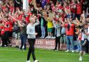 Ben Garner salutes Swindon Town fans at Walsall on the last day of the regular season. Picture: ROB NOYES